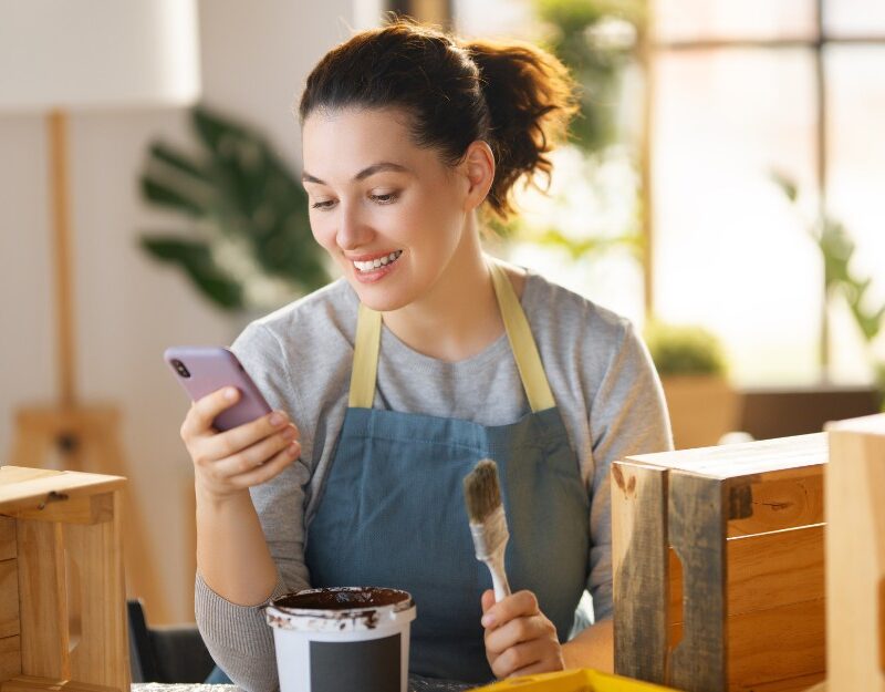 Woman smiling checking home loans for self-employed
