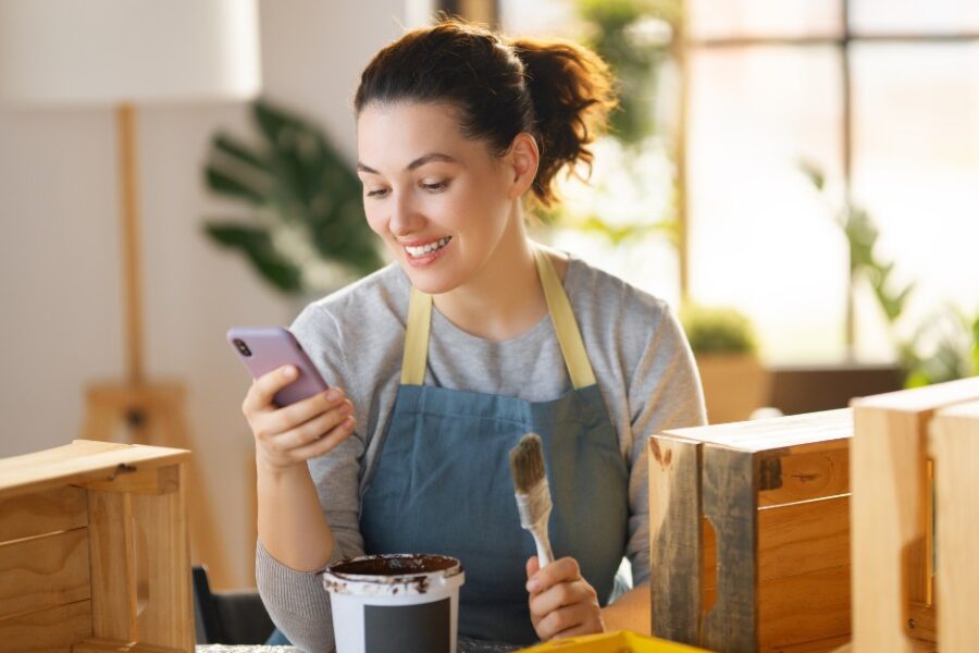 Woman smiling checking home loans for self-employed
