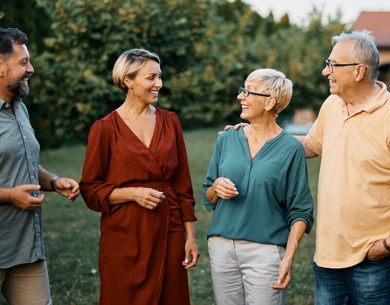 Happy couple talking to parents/family about a guarantor home loan