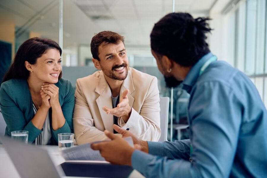 Couple talking to a mortgage broker about a home loan and their borrowing capacity